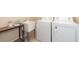 Laundry room with washer, dryer, and utility sink at 10309 Coral Landings Ct # 101, Placida, FL 33946