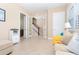 Spacious living room with ample natural light and access to other rooms at 10309 Coral Landings Ct # 101, Placida, FL 33946