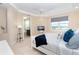 Main bedroom with ensuite bathroom and water views at 10309 Coral Landings Ct # 101, Placida, FL 33946