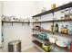 Well-organized pantry with ample shelving for storage at 10309 Coral Landings Ct # 101, Placida, FL 33946