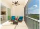 Relaxing screened balcony overlooking a lush landscape at 10309 Coral Landings Ct # 101, Placida, FL 33946