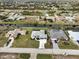 Wide aerial showcasing home and neighborhood at 256 Mariner Ln, Rotonda West, FL 33947