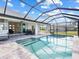 Inviting pool area with covered patio and outdoor seating at 256 Mariner Ln, Rotonda West, FL 33947