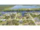 Aerial view of waterfront community and property at 10721 Ayear Rd, Port Charlotte, FL 33981