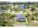 Aerial view showing house, pool, and canal location at 10721 Ayear Rd, Port Charlotte, FL 33981