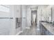 Elegant bathroom with granite countertops and walk-in shower at 10721 Ayear Rd, Port Charlotte, FL 33981