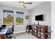 Bright home office features built-in cabinetry and window views at 10721 Ayear Rd, Port Charlotte, FL 33981