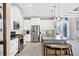 Modern kitchen with stainless steel appliances and granite island at 10721 Ayear Rd, Port Charlotte, FL 33981