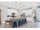 Spacious kitchen with white cabinets, granite countertops, and large island at 10721 Ayear Rd, Port Charlotte, FL 33981