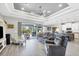 Open concept living area with pool view and modern decor at 10721 Ayear Rd, Port Charlotte, FL 33981