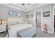 Main bedroom with ensuite bathroom access and large bed at 10721 Ayear Rd, Port Charlotte, FL 33981
