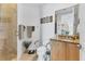 Accessible bathroom with granite vanity and grab bars at 1375 Beach Rd # 210, Englewood, FL 34223