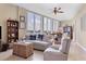Spacious living room with water views and seating at 1375 Beach Rd # 210, Englewood, FL 34223