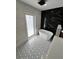 Bathroom with walk in shower and patterned tile at 15267 Appleton Blvd, Port Charlotte, FL 33981