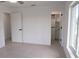 Bedroom with walk-in closet and window at 15267 Appleton Blvd, Port Charlotte, FL 33981