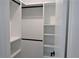 Spacious closet with built-in shelves and hanging rods at 15267 Appleton Blvd, Port Charlotte, FL 33981
