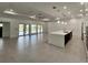 Open concept kitchen with large island and stainless steel appliances at 15267 Appleton Blvd, Port Charlotte, FL 33981