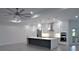 Modern kitchen with island and stainless steel appliances at 15267 Appleton Blvd, Port Charlotte, FL 33981