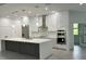 Modern kitchen with island and stainless steel appliances at 15267 Appleton Blvd, Port Charlotte, FL 33981