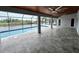 Spacious lanai with pool and water view at 15267 Appleton Blvd, Port Charlotte, FL 33981