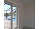 Window view of canal, pool, and lush landscape at 15267 Appleton Blvd, Port Charlotte, FL 33981