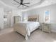Bright bedroom with light wood furniture and pool view at 261 Broadmoor Ln, Rotonda West, FL 33947