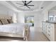 Main bedroom with sliding doors leading to the pool at 261 Broadmoor Ln, Rotonda West, FL 33947