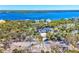 Modern home situated on a waterfront lot with a private driveway at 7161 Manasota Key Rd, Englewood, FL 34223