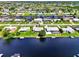 Expansive aerial showcasing canal-front homes at 544 Lindley Ter, Port Charlotte, FL 33952