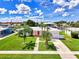 Bird's-eye view of single-Gathering home and canal at 544 Lindley Ter, Port Charlotte, FL 33952