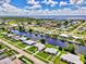 Expansive aerial view of canal-front homes at 544 Lindley Ter, Port Charlotte, FL 33952