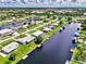 Bird's-eye view of canal-side homes at 544 Lindley Ter, Port Charlotte, FL 33952