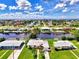 Wide aerial showcasing waterfront community at 544 Lindley Ter, Port Charlotte, FL 33952