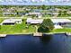 Home nestled on the canal with a large yard at 544 Lindley Ter, Port Charlotte, FL 33952