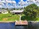 Aerial view showing home, dock, and canal location at 544 Lindley Ter, Port Charlotte, FL 33952