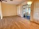 Dining room with vinyl flooring and access to a screened porch at 544 Lindley Ter, Port Charlotte, FL 33952