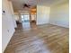 Bright living room featuring light vinyl flooring and sliding glass doors at 544 Lindley Ter, Port Charlotte, FL 33952