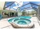 Enjoy this refreshing pool and spa with tiled accents at 7293 Spinnaker Blvd, Englewood, FL 34224