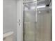 Shower stall with glass enclosure and neutral tile at 740 Summersea Ct, Englewood, FL 34223