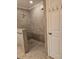 Walk-in shower with grab bars and accessible design at 881 Bayshore Dr, Englewood, FL 34223