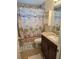 Bathroom with beach-themed decor and granite countertop at 881 Bayshore Dr, Englewood, FL 34223