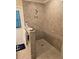 Large walk-in shower with tile surround and built-in shelving at 881 Bayshore Dr, Englewood, FL 34223