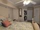 Bedroom with ceiling fan and double bed at 881 Bayshore Dr, Englewood, FL 34223