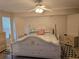 Bedroom with ceiling fan and light wood bed at 881 Bayshore Dr, Englewood, FL 34223