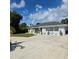 Newly renovated home with a modern exterior at 881 Bayshore Dr, Englewood, FL 34223