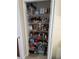 Well-stocked pantry with ample shelving for food storage at 881 Bayshore Dr, Englewood, FL 34223