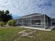 Screened pool and patio area at 881 Bayshore Dr, Englewood, FL 34223