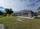 Screened-in pool and patio area at 881 Bayshore Dr, Englewood, FL 34223