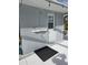 Outdoor shower adjacent to the pool at 881 Bayshore Dr, Englewood, FL 34223