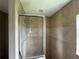 Clean shower with tiled walls and glass enclosure at 35 Mark Twain Ln, Rotonda West, FL 33947